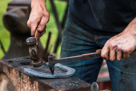horseshoe being crafted by a skilled blacksmith/farrier