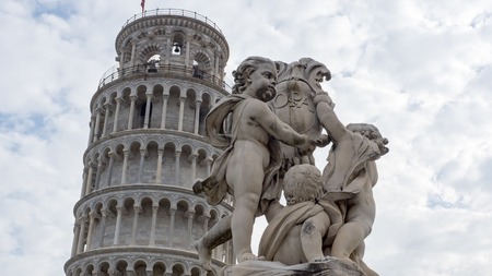 Leaning Tower of Pisa with a statueの写真素材