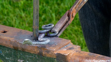 Detailed shot of metal being worked at a blacksmithing forgeの写真素材