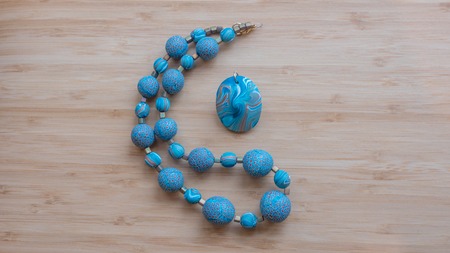 Original beads from polymeric hand-worked clayの写真素材