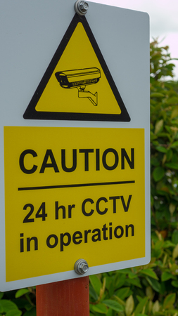 CCTV 24 hour Security Camera video surveillance signの写真素材
