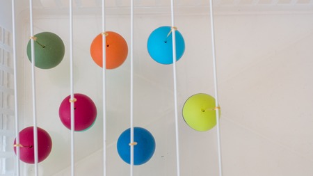 painting polymer clay beads. Handmade workshop composition of clay, beads, tools and paintの写真素材