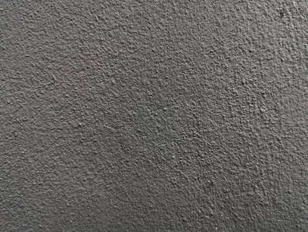Glossy Black Concrete Wall. Rough surface of the cement wallの写真素材