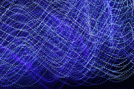 White and blue curve on blackの写真素材