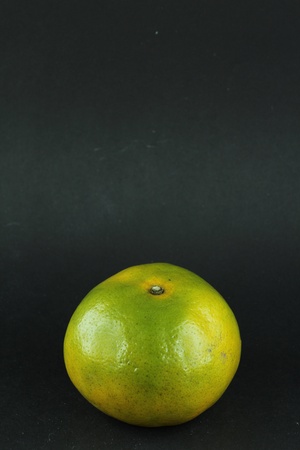 Orange on black backgroundの写真素材