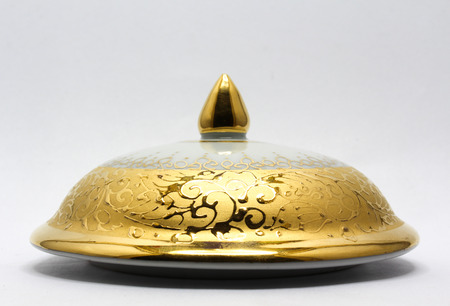 Antique porcelain on white background.の写真素材