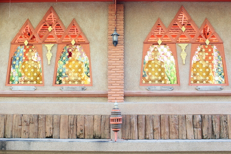 Native art carved in Thai temple.の写真素材