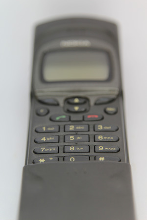 Closeup of mobile phone keypad isolated on white.