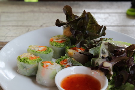 Fresh spring rolls on white plate, Vietnamese Cuisine.