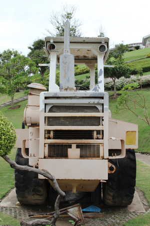 Old rusty tractor to retired.