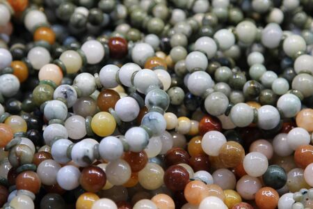 Round stone bracelet closeup background.の写真素材