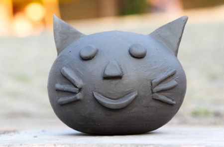 Cat sculpture made from clay.の写真素材