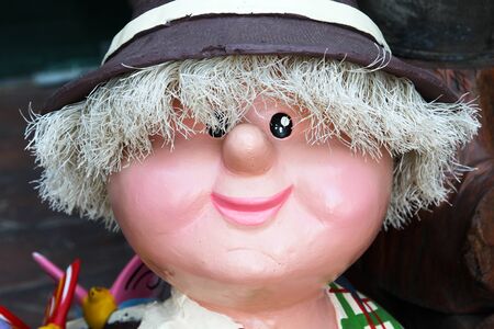 Grandmother doll standing in the garden.の写真素材