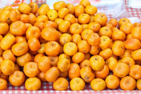 Pile of orange ready for sale in the market.の写真素材