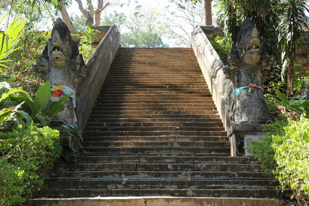 Old naga stairway at Wat U-Mong, Chiangmai, Thailand.の写真素材