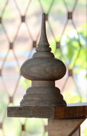 Wooden pole, Thai style wood carving.の写真素材