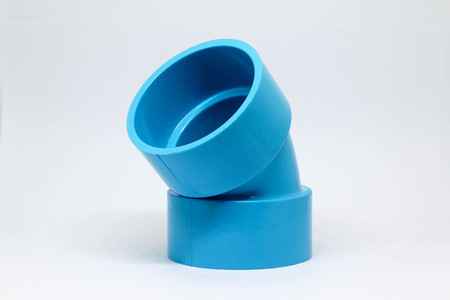 PVC pipe fitting on white background.