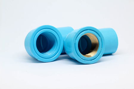 PVC pipe fitting on white background.