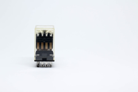 Electrical auxiliary relay in transparent plastic cases on white background.の写真素材