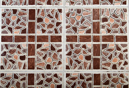 Brown traditional floor tiles of old house.
