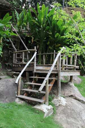 Old wooden stair in hotel resort, Chiangmai, Thailand.の写真素材