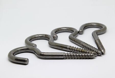 Metal hooks screw isolated on white background.の写真素材