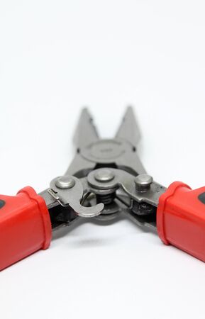 Compound action pliers isolated on white background.