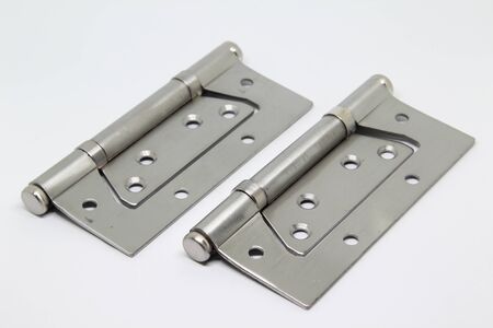 Stainless door hinge isolated on white background.の写真素材