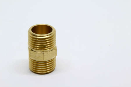 Brass fitting isolated on white background.