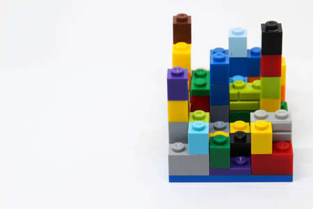 Colorful plastic building blocks isolated on white background.の写真素材