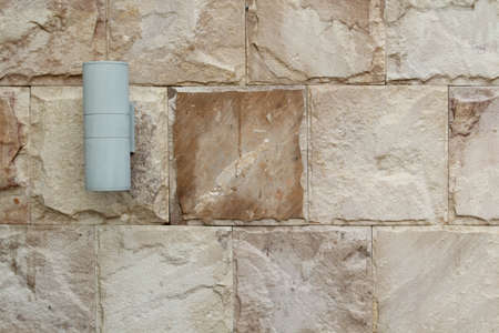Lamps on concrete wall texture background.