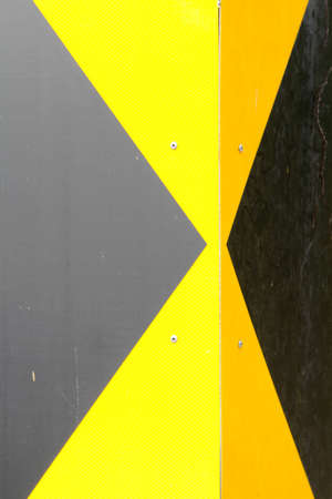 Yellow and black traffic sign.