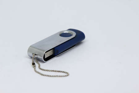 Blue USB flash drive isolated on white background.