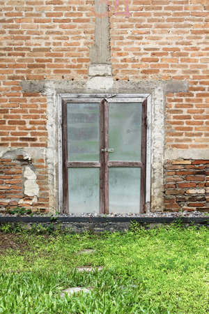 The door of the old style Tobacco curing plant in Chiangmai province, Northern Thailand.の写真素材