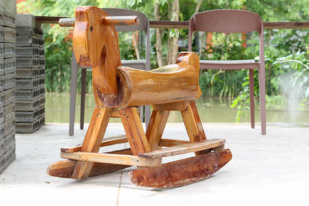 Wooden rocking horse in the outdoor cafe.の写真素材