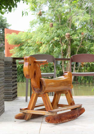 Wooden rocking horse in the outdoor cafe.の写真素材
