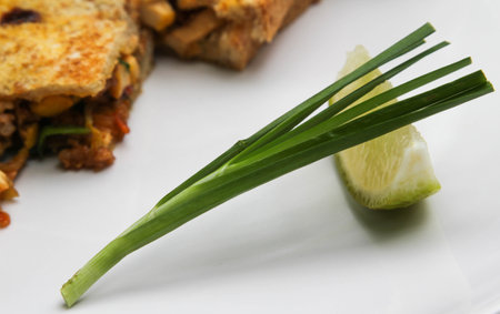 Pad Thai - Thai fusion food - Stir fried rice noodles on white ceramic plateの写真素材