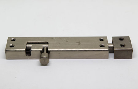 A steel door latch on white backgroundの写真素材