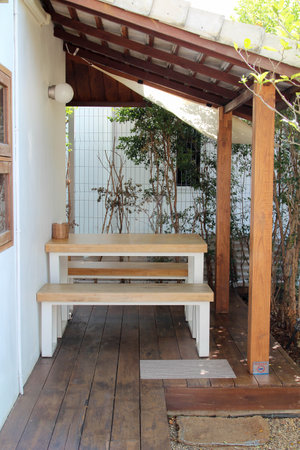 The empty wooden table and chair setの写真素材