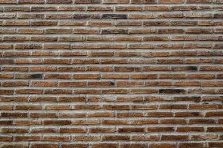 Red brick wall with fence background 