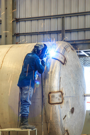 Welding sparks of welders in the offshore industry.