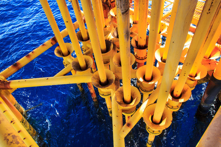 Offshore drill yellow oil and gas production petroleum pipeline.