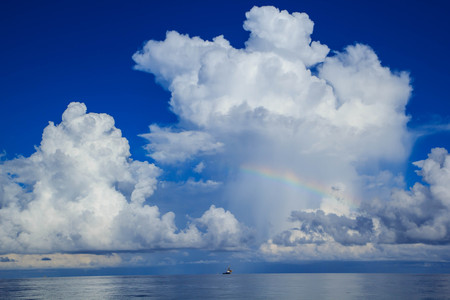 Cloudy skies and water natural beautyの写真素材