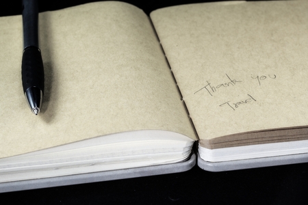 note book paper  travel details the daily life.の写真素材