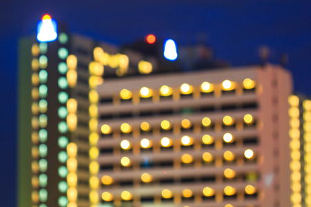 Abstract urban night light bokeh defocused backgroundの写真素材