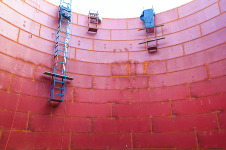Storage tank oil about wall  of tank production petroleum refinery