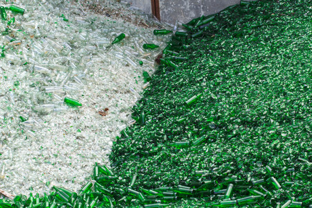 background many recycle pieces of broken glass in greenの写真素材