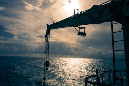 Crane lifting offshore industrial oil and gas.の写真素材