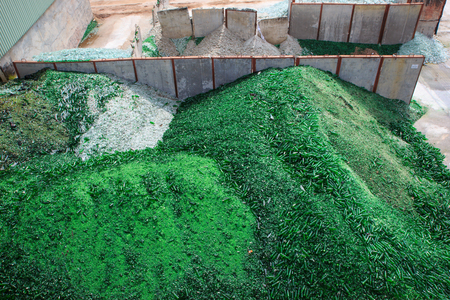 Top view background many recycle pieces of broken glass in greenの写真素材