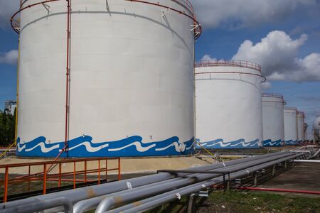 Chemical industry with fuel storage tank background sky blue